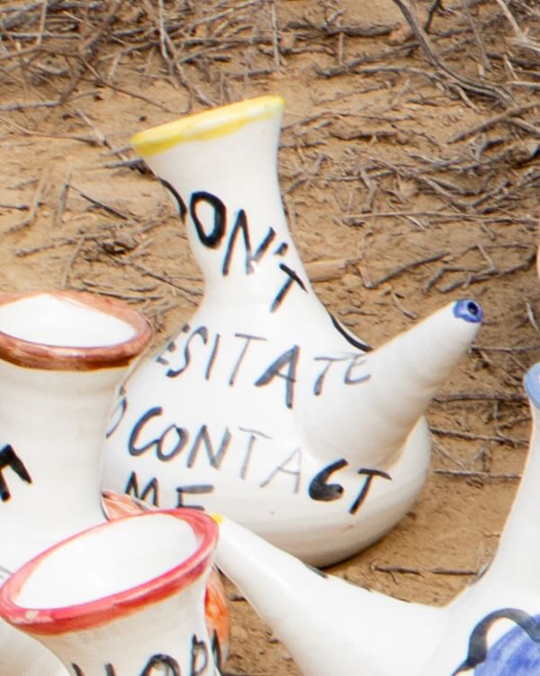 "Don't hesitate to contact me" wine pitcher