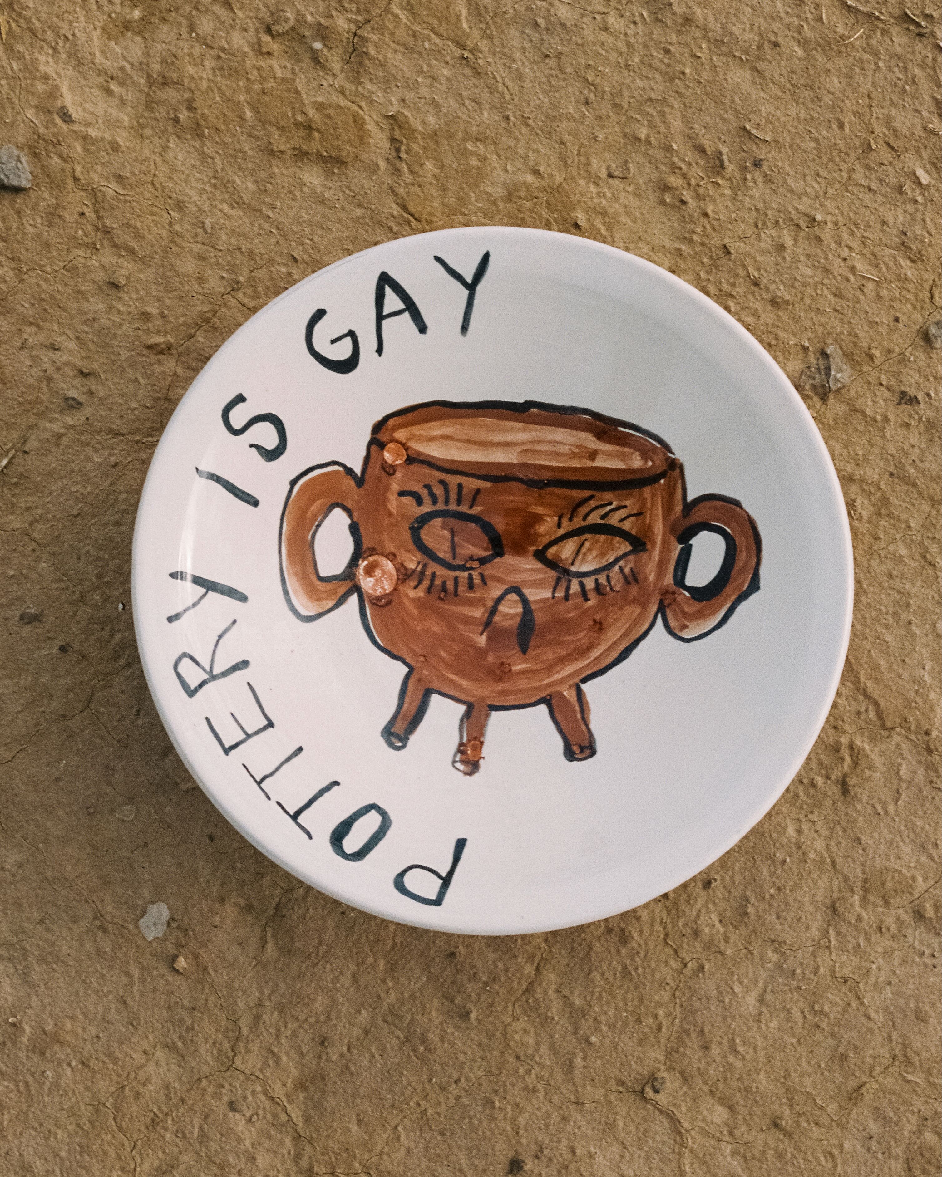 "Pottery is gay" big platter